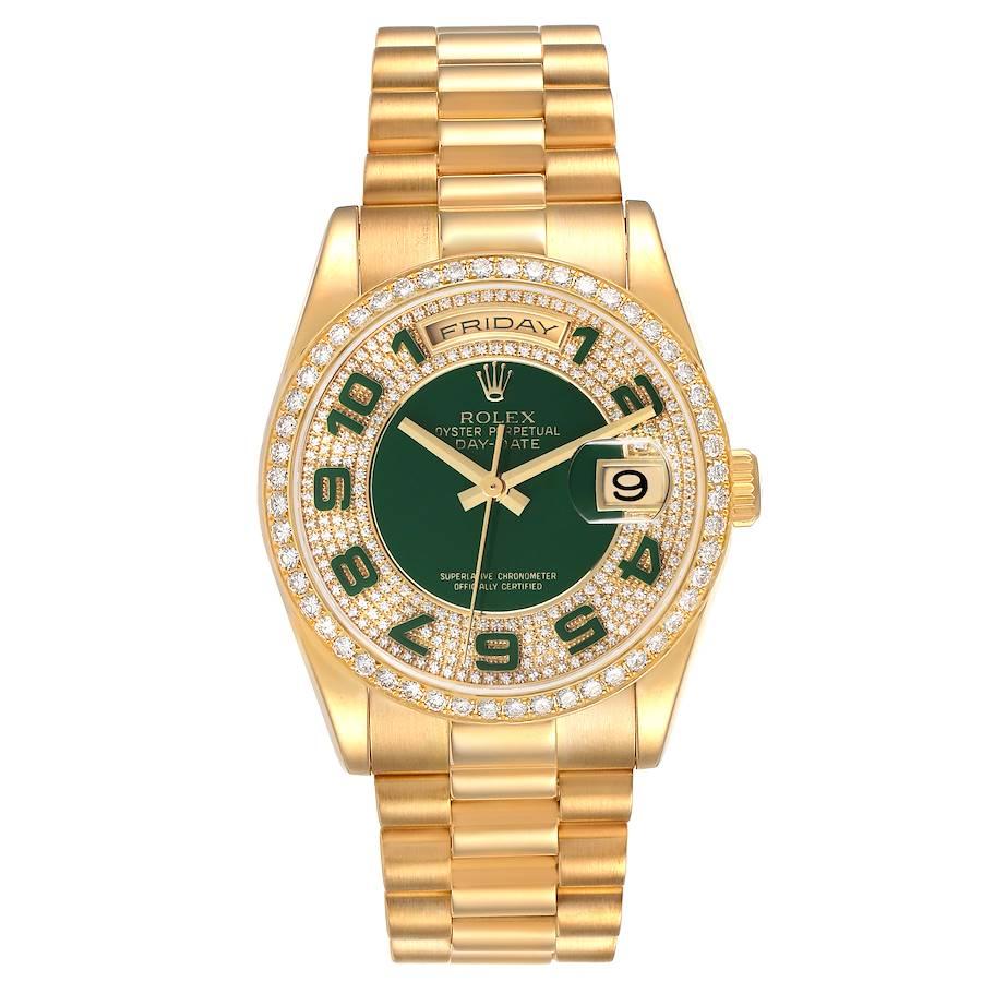 Rolex President Day Date Yellow Gold Green Enamel Diamond Mens Watch 118348. Officially certified chronometer self-winding movement. 18k yellow gold oyster case 36 mm in diameter. Rolex logo on a crown. Original Rolex 18K yellow gold diamond bezel.