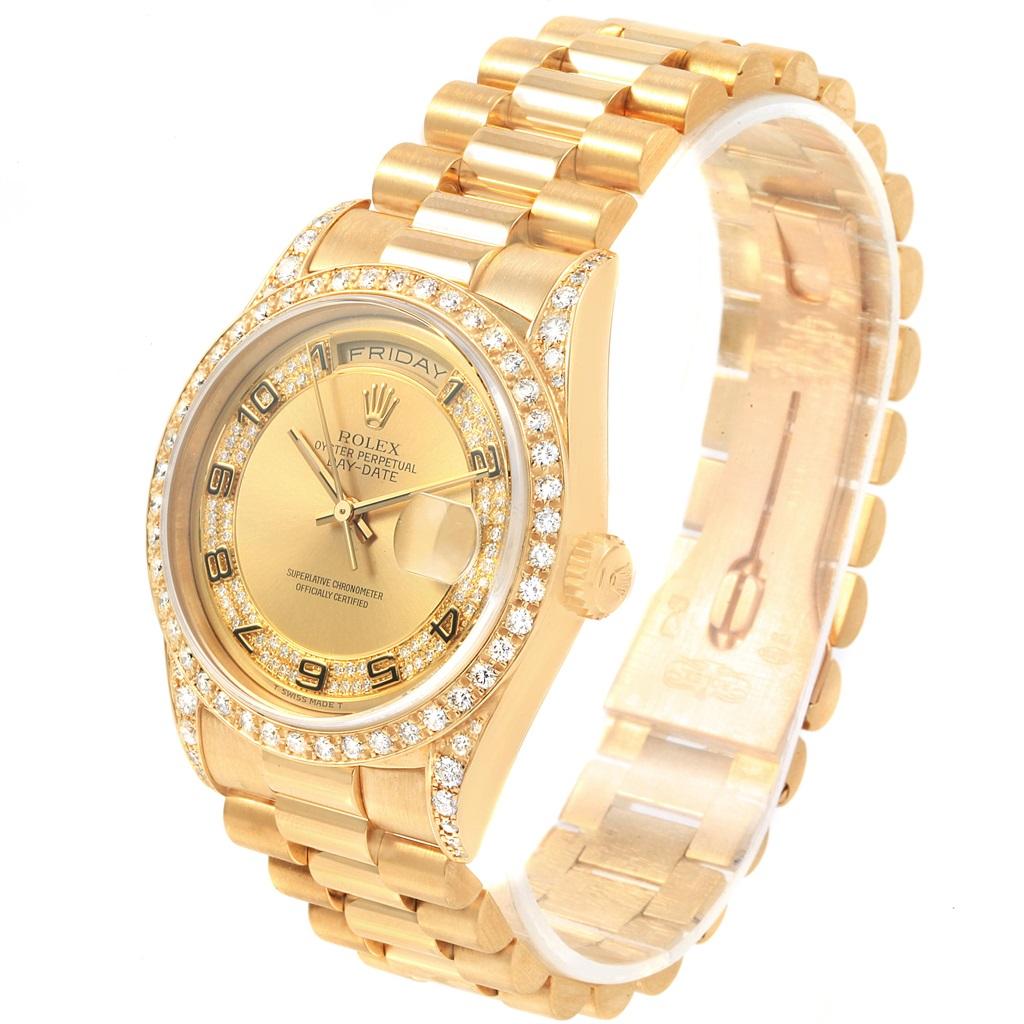 Rolex President Day-Date Yellow Gold Myriad Diamond Mens Watch 18388. Officially certified chronometer self-winding movement. double quick set function. 18k yellow gold oyster case 36.0 mm in diameter. Rolex logo on a crown. Diamond lugs. 18K yellow