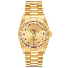 Rolex President Day-Date Yellow Gold String Diamond Ruby Dial Watch 18238