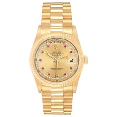 Rolex President Day-Date Yellow Gold String Diamond Ruby Dial Watch 18238