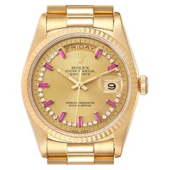Rolex President Day-Date Yellow Gold String Diamond Ruby Dial Watch 18238