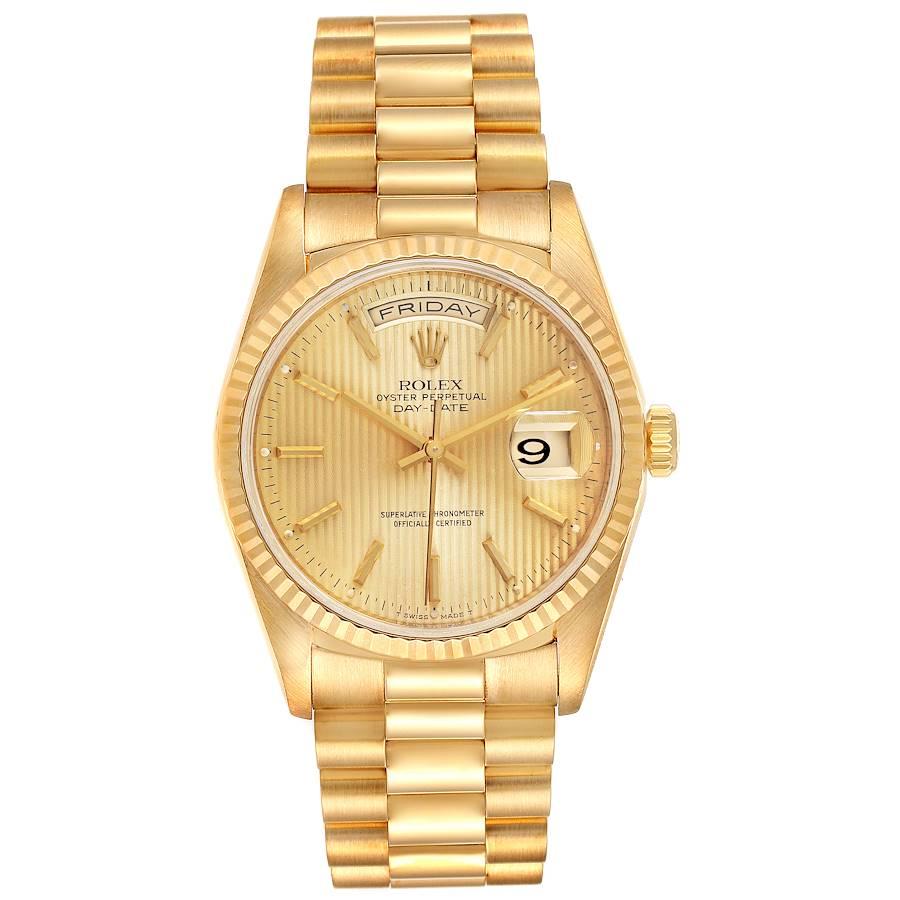 Rolex President Day-Date Yellow Gold Tapestry Dial Mens Watch 18238. Officially certified chronometer self-winding movement. 18k yellow gold oyster case 36.0 mm in diameter.  Rolex logo on a crown. 18K yellow gold fluted bezel. Scratch resistant