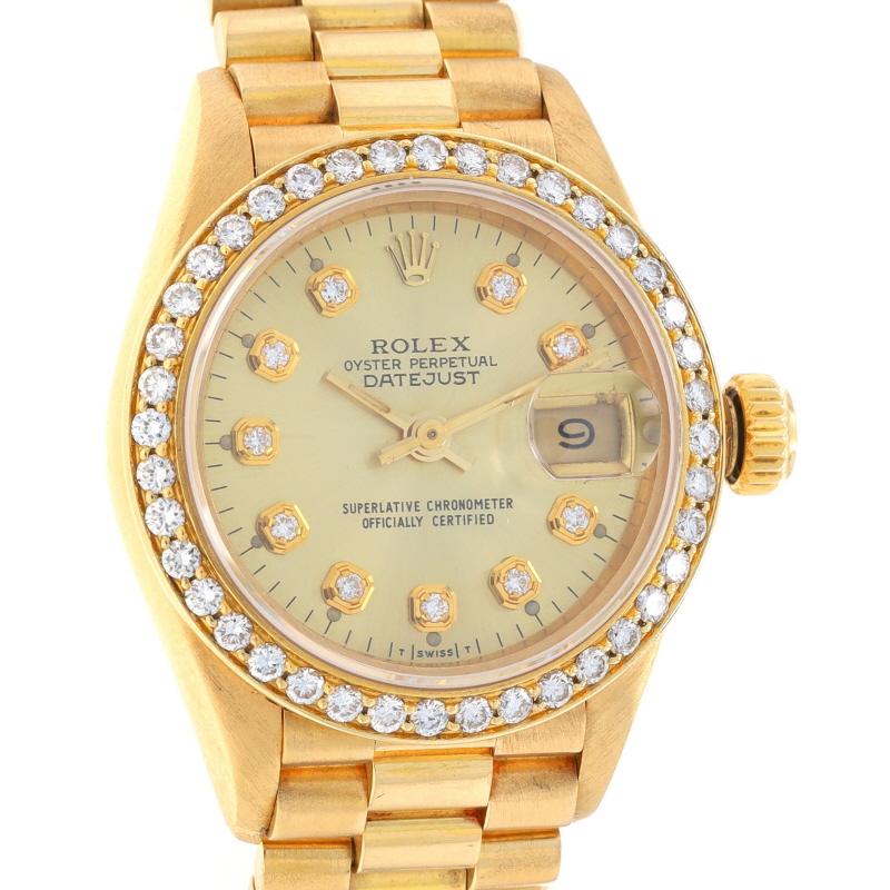 Brand: Rolex
Model: President
Model Number: 69178
Movement: Automatic
Warranty: One Year
Year: 1990
Movement Maker: Swiss
Dial Color: Champagne

Metal Content: 18k Yellow Gold

Stone Information
Natural Diamonds
Carat(s): 1.00ctw
Cut: Round