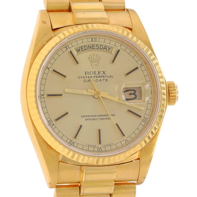 Brand: Rolex
Model: President
Model Number: 18038
Movement: Automatic
Warranty: One Year
Year: 1980
Movement Maker: Swiss
Dial Color: Champagne

Metal Content: 18k Yellow Gold

Fastening Type: Fold-Over Clasp
Features: 
Fluted bezel  
Screw-down