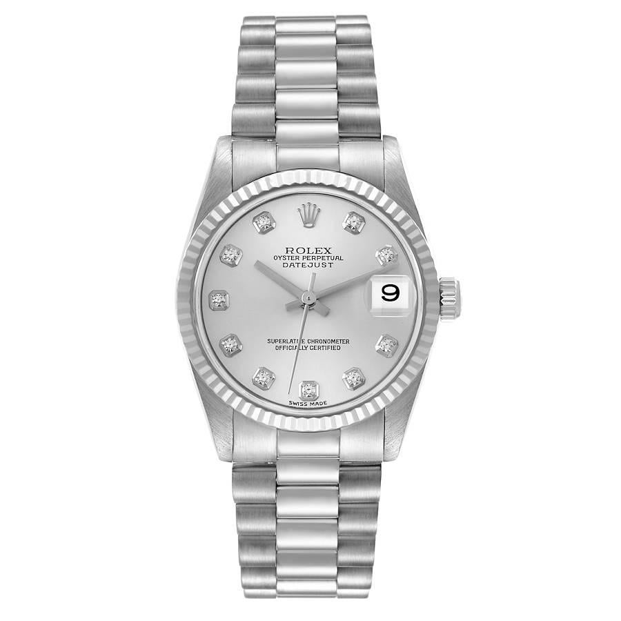 Rolex President Midsize White Gold Diamond Ladies Watch 78279 Box Papers. Officially certified chronometer self-winding movement. 18k white gold oyster case 31.0 mm in diameter. Rolex logo on a crown. 18k white gold fluted bezel. Scratch resistant