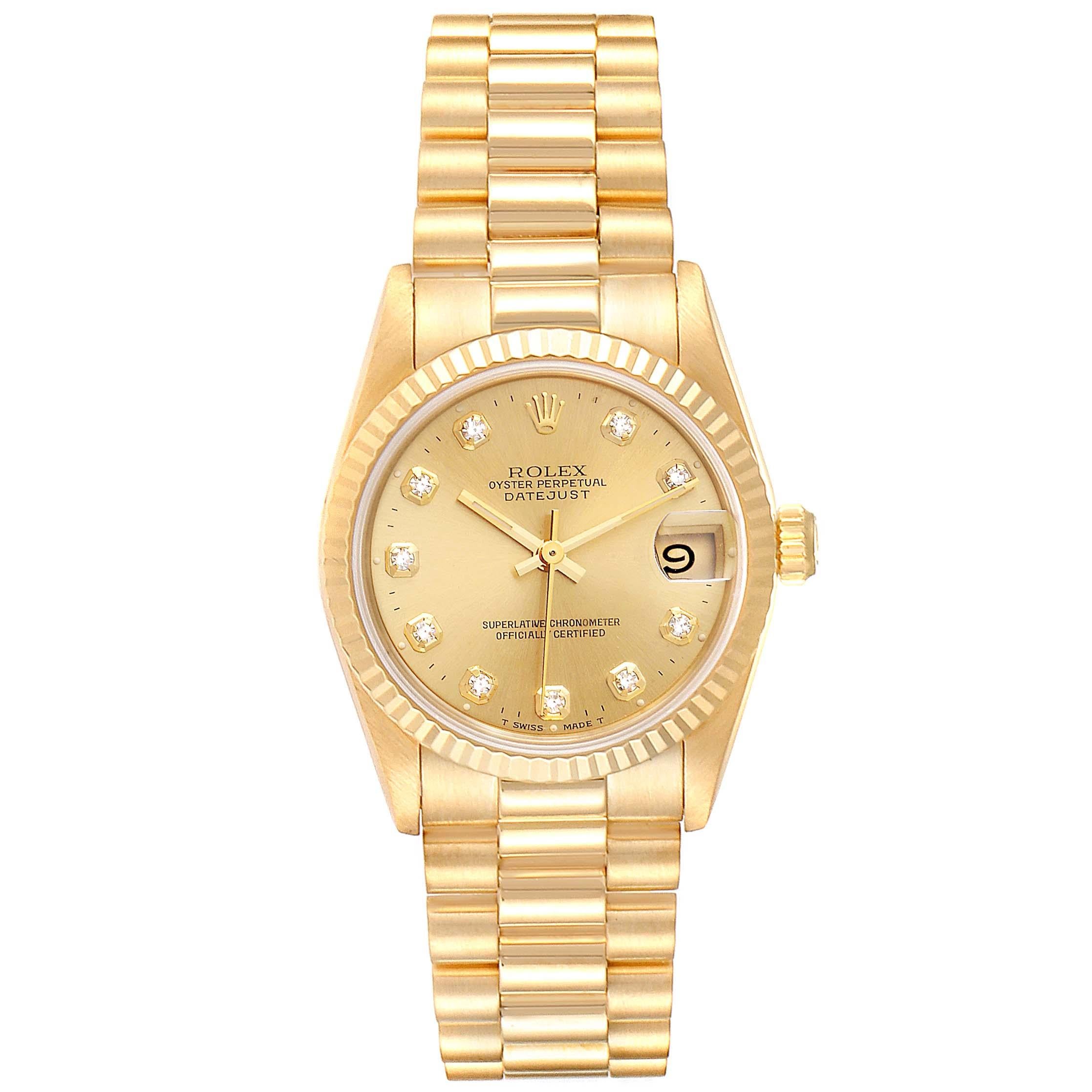 Rolex President Midsize Yellow Gold Diamond Ladies Watch 68278 Box Papers. Officially certified chronometer self-winding movement. 18k yellow gold oyster case 31.0 mm in diameter. Rolex logo on a crown. 18k yellow gold fluted bezel. Scratch