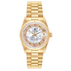 Rolex President Midsize Yellow Gold MOP Ruby Myriad Dial Ladies Watch 68278