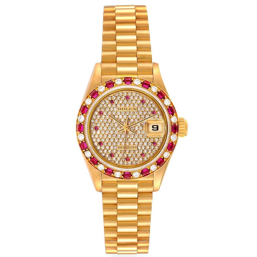 Rolex President Yellow Gold Diamond Ruby Ladies Watch 69198 Box Papers. Officially certified chronometer self-winding movement. 18k yellow gold oyster case 26.0 mm in diameter. Rolex logo on a crown. 18k yellow gold diamond rubies bezel. Scratch