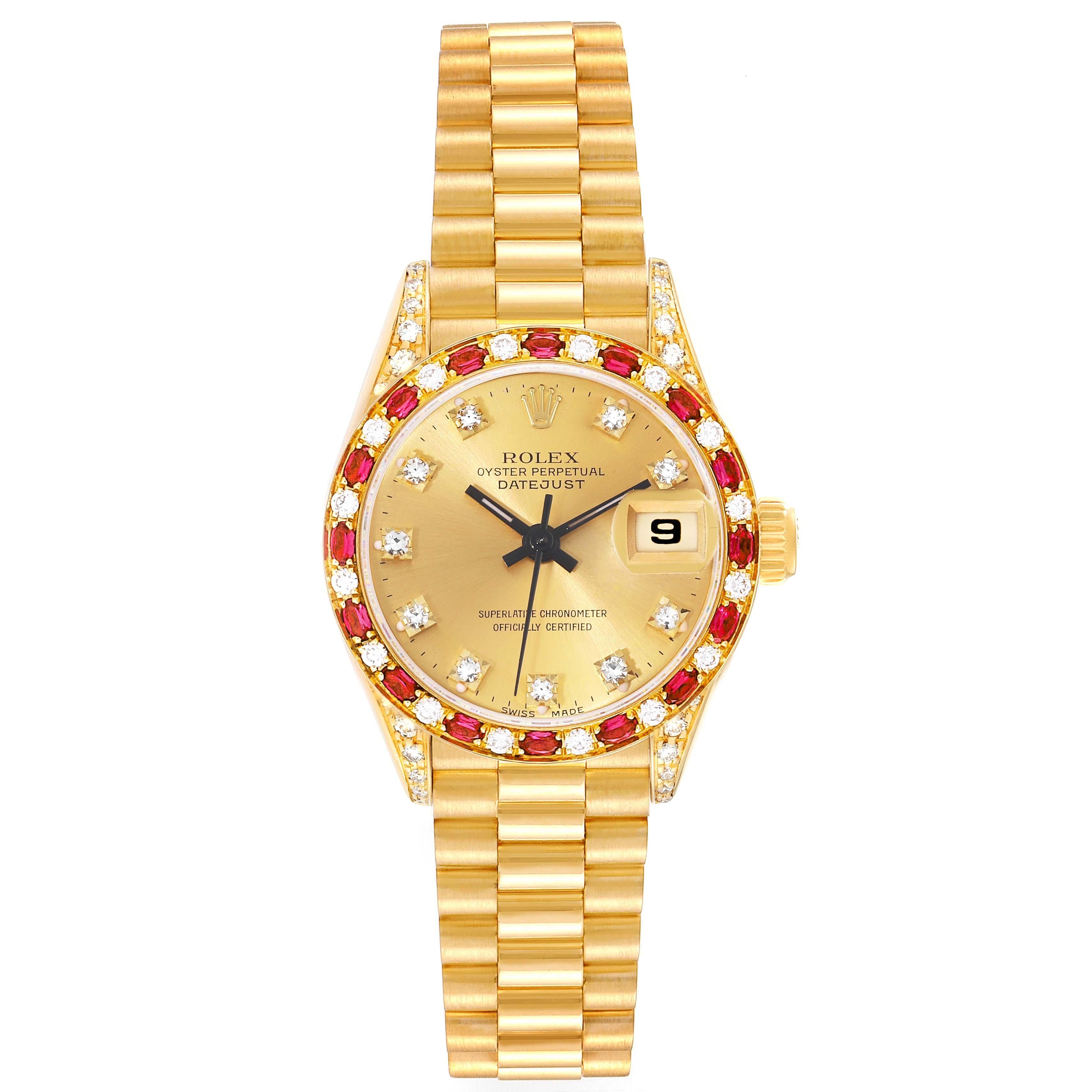 Rolex President Yellow Gold Diamond Ruby Ladies Watch 69198. Officially certified chronometer automatic self-winding movement. 18k yellow gold oyster case 26.0 mm in diameter. Rolex logo on the crown. Original Rolex factory diamond encrusted lugs.