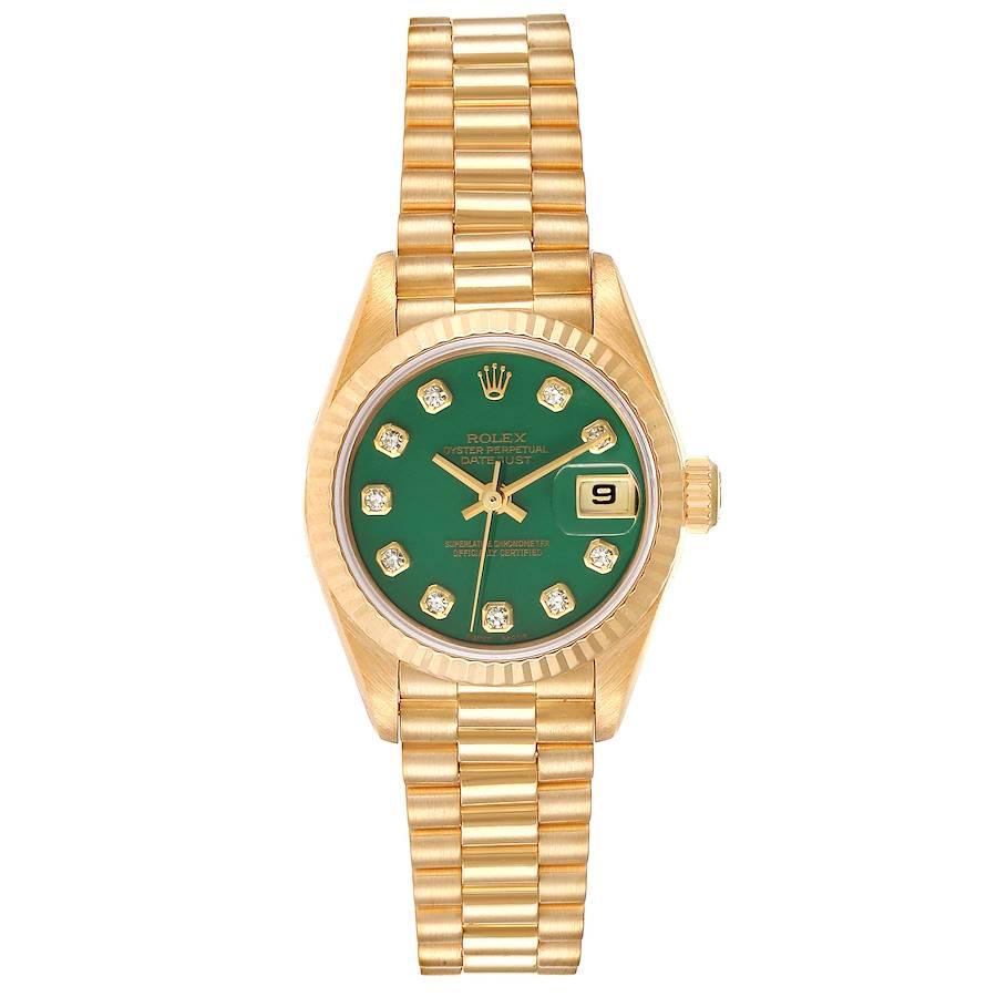 Rolex President Yellow Gold Green Stone Diamond Ladies Watch 69178 Box Papers. Officially certified chronometer self-winding movement. 18k yellow gold oyster case 26.0 mm in diameter. Rolex logo on a crown. 18k yellow gold fluted bezel. Scratch