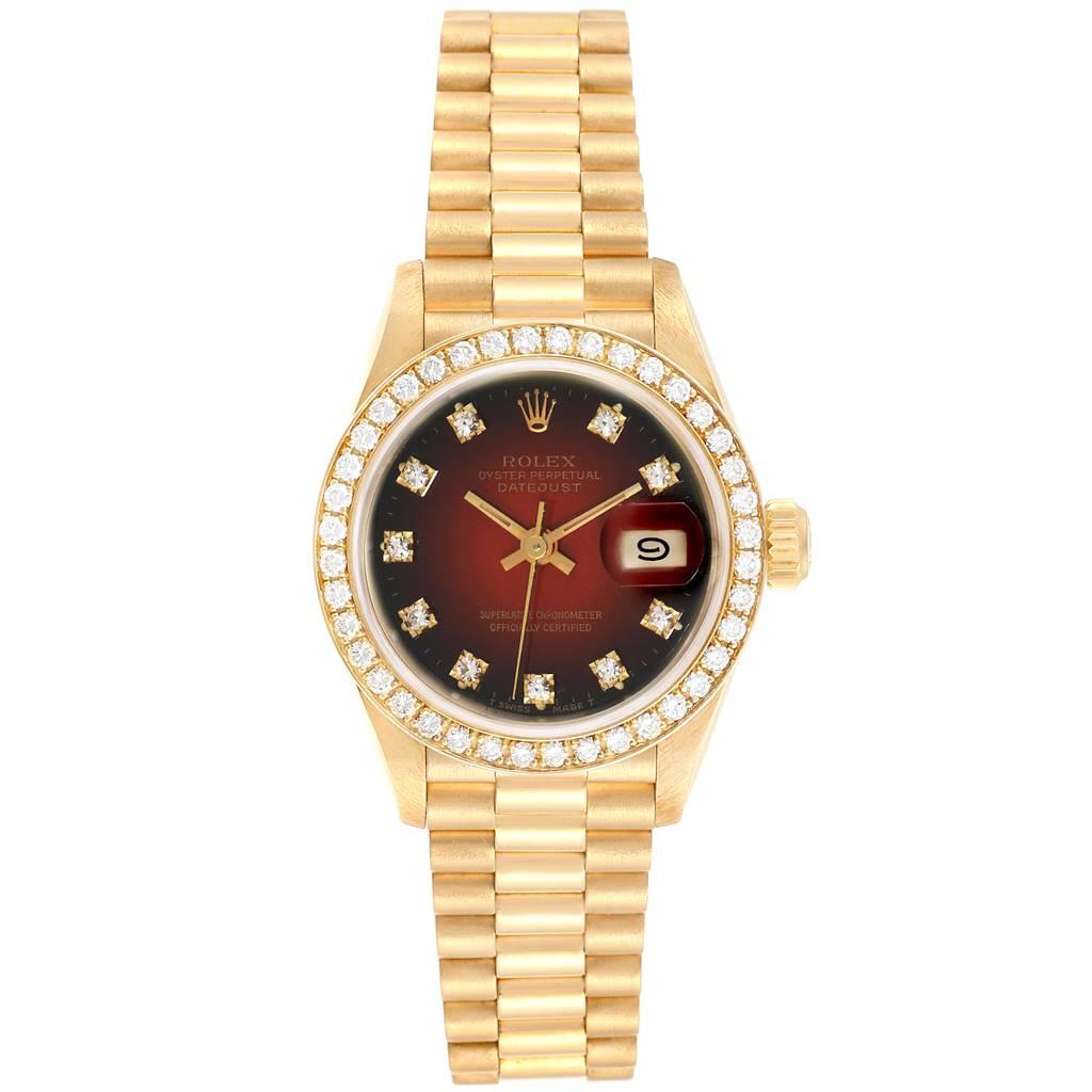 Rolex President Yellow Gold Red Vignette Diamond Ladies Watch 69138. Officially certified chronometer self-winding movement. 18k yellow gold oyster case 26.0 mm in diameter. Rolex logo on a crown. Original Rolex 18k yellow gold diamond bezel.