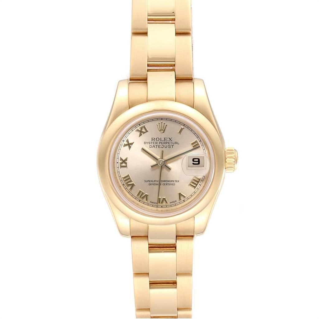 Rolex President Yellow Gold Roman Dial Ladies Watch 179168 Box Papers. Officially certified chronometer automatic self-winding movement. 18k yellow gold oyster case 26.0 mm in diameter. Rolex logo on a crown. 18k yellow gold smooth domed bezel.