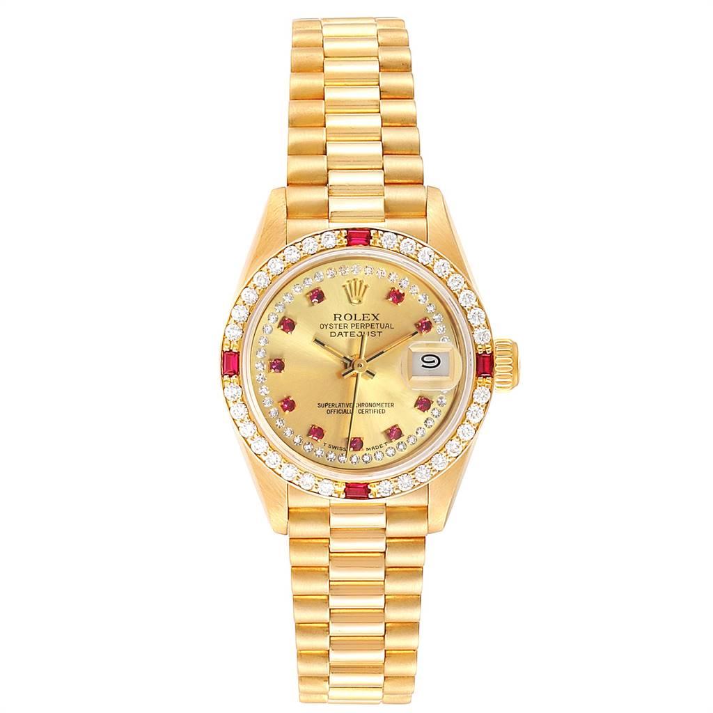 Rolex President Yellow Gold String Dial Diamond Ruby Ladies Watch 69068. Officially certified chronometer self-winding movement. 18k yellow gold oyster case 26.0 mm in diameter. Rolex logo on a crown. Original Rolex factory diamond and ruby bezel.