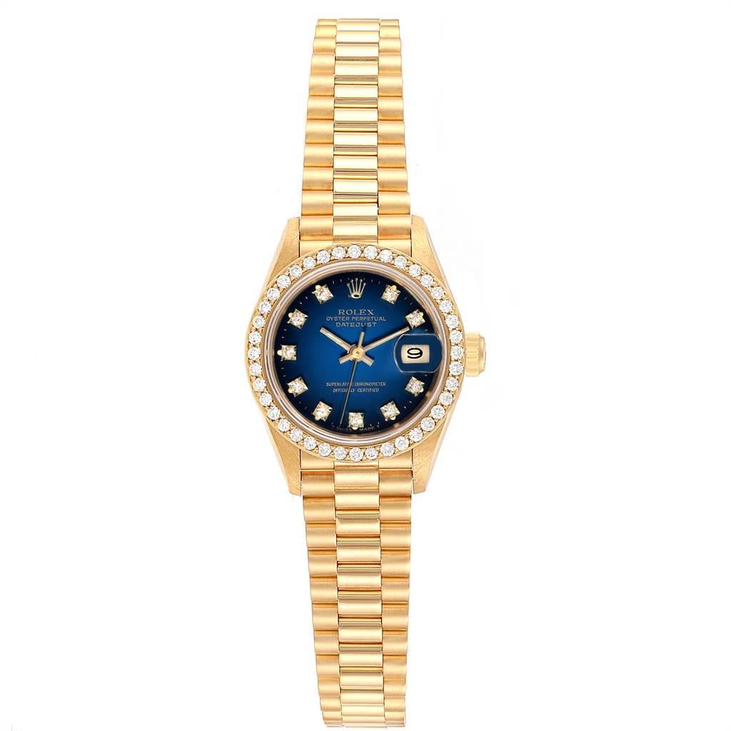 Rolex President Yellow Gold Vignette Diamond Ladies Watch 69138 Box Papers. Officially certified chronometer self-winding movement. 18k yellow gold oyster case 26.0 mm in diameter. Rolex logo on a crown. Original Rolex 18k yellow gold diamond bezel.