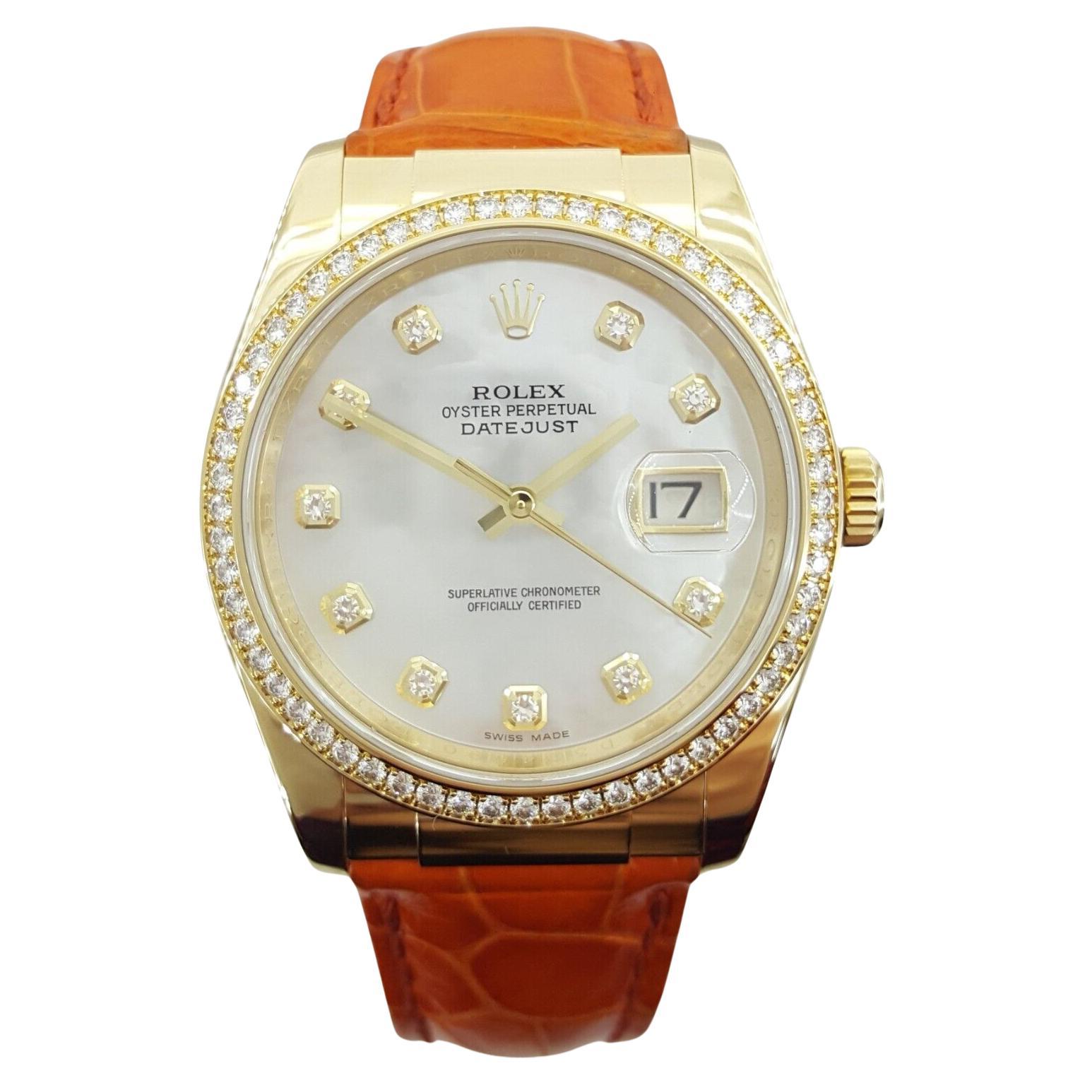 You are purchasing an Authentic Rolex Lady DateJust 116188, a 36mm timepiece crafted in 18K Yellow Gold, featuring a Factory Mother of Pearl Diamond Dial and a Factory Diamond Bezel.

This watch is a true marvel, equipped with a screw-down crown and