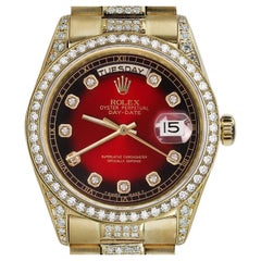 Rolex Montre présidentielle en or jaune 18 carats avec cadran Vignette rouge et diamants