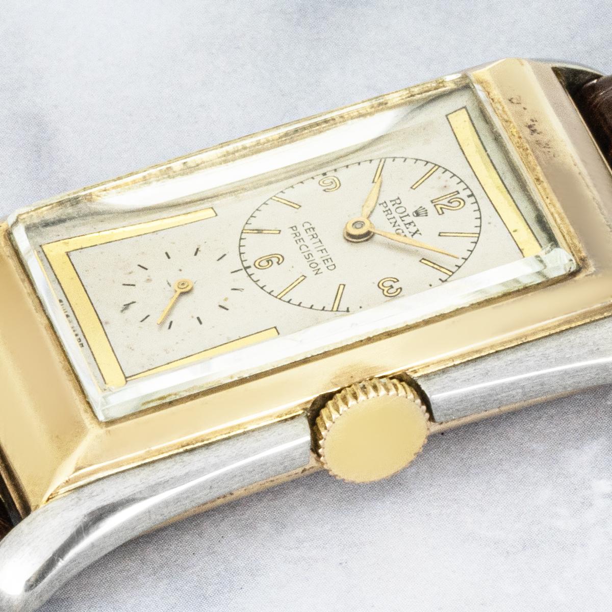 A vintage  9k yellow and white gold Rolex Prince ref: 1490, another fine example of a rare Rolex creation. Featuring it's original silver dial with gilt borders, applied gilt baton hour markers with Arabic numeral quarters and subsidiary seconds