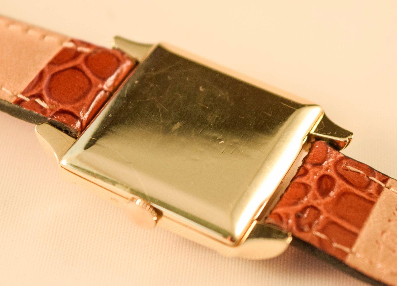 Rolex  rara y atractiva caja de oro macizo con inusuales asas en venta 1