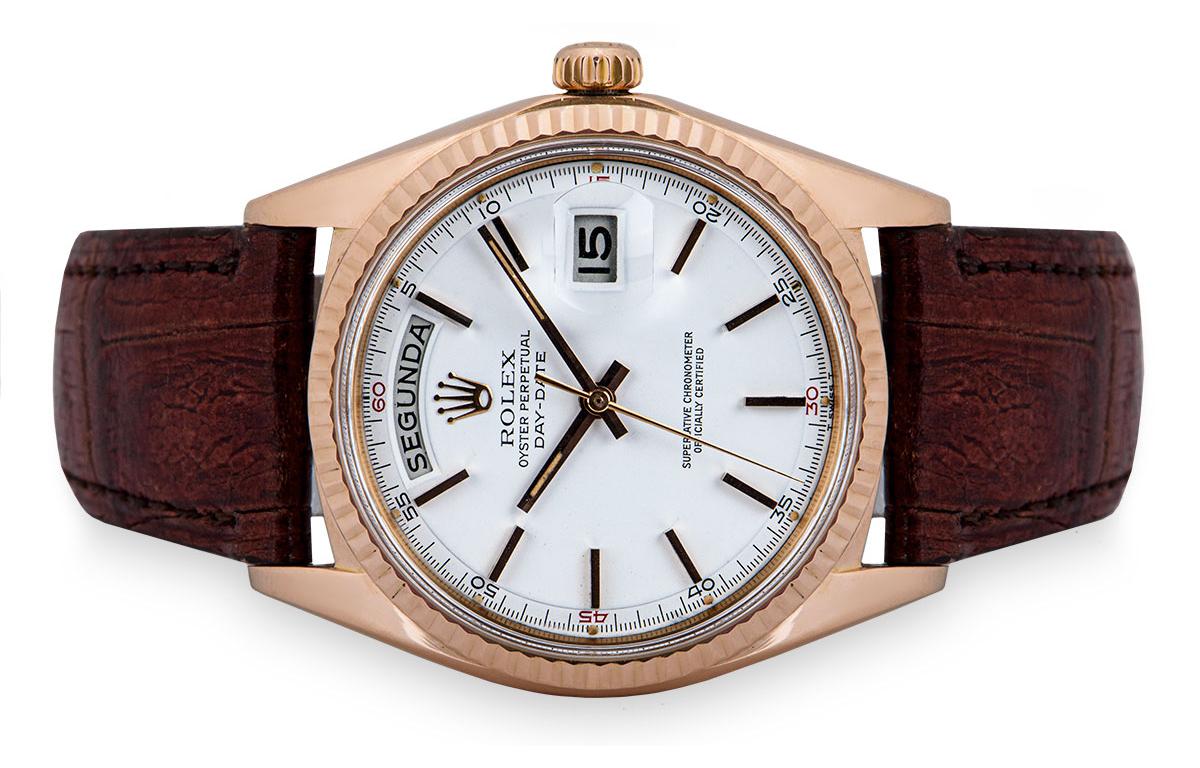 A 36 mm Rare 18k Rose Gold Oyster Perpetual Day-Date Vintage Gents Wristwatch, white dial with applied hour markers and red quarters of the hour, day at 12 0'clock, date at 3 0'clock, a fixed 18k rose gold fluted bezel, a brown leather strap (not by