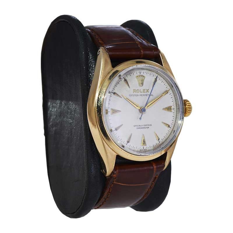 FACTORY / HOUSE: Rolex Watch Company
STYLE / REFERENCE: Oyster Perpetual  / Reference 6334
METAL / MATERIAL: Yellow Gold Shell 
CIRCA / YEAR: 1953 / 54
DIMENSIONS / SIZE: Length 42mm X Diameter 34mm
MOVEMENT / CALIBER: Perpetual Winding / 20 Jewels