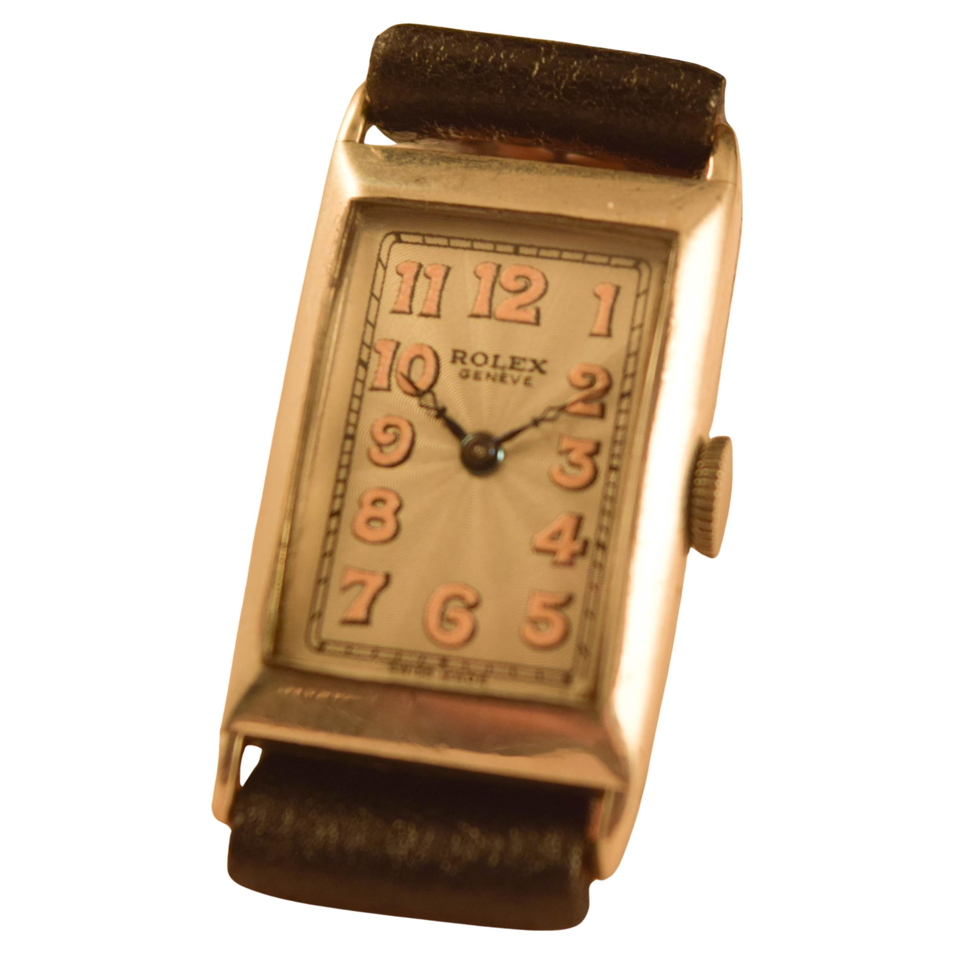Rolex super rare rectangular case in Silver.
Beautiful dial signed Rolex Geneva.
Attractive
Bold Attractive luminious numbers and attractive blued original hands.


Case inside is signed Rolex 16 world records.
Gold medal Geneva Suisse
0.925 Silver