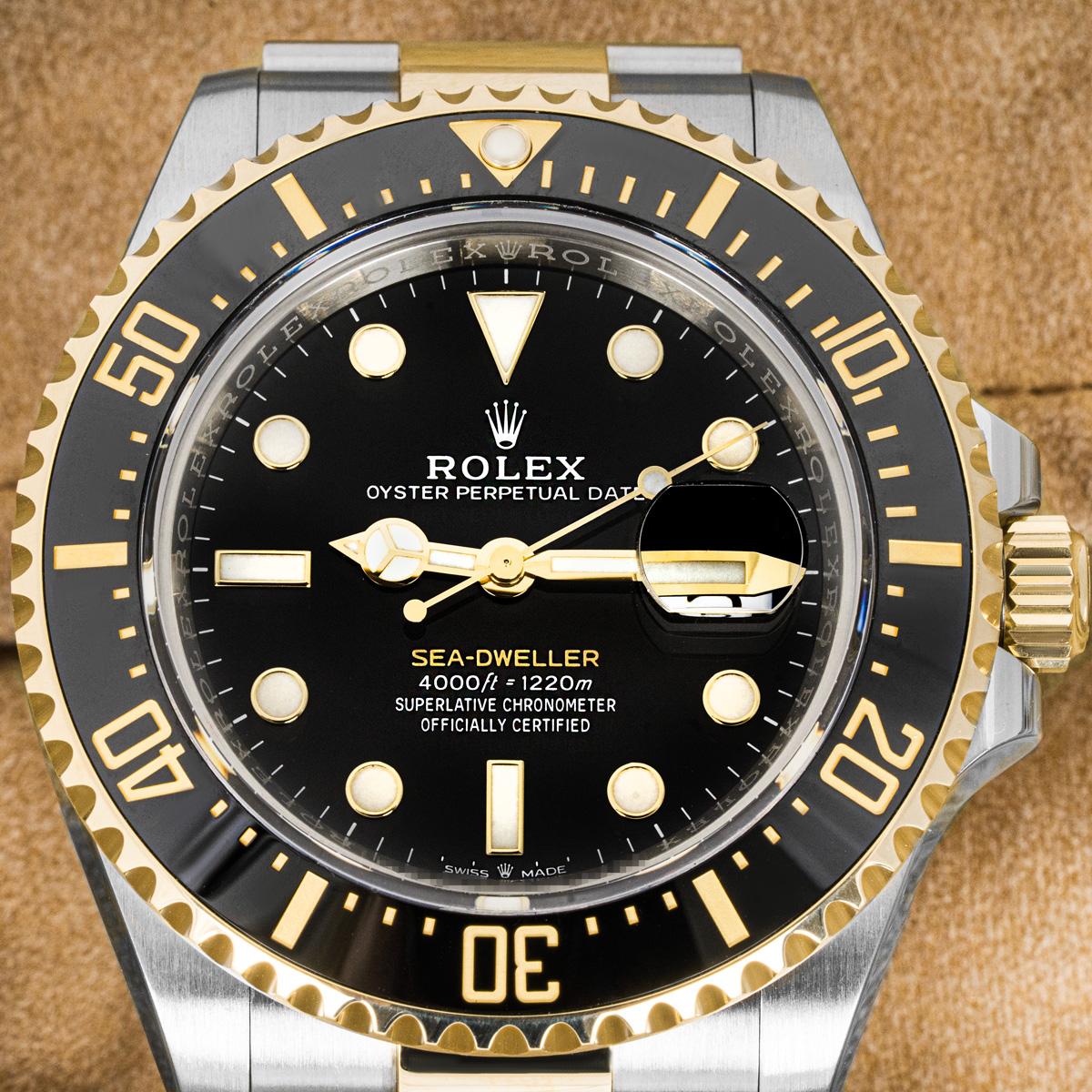 A 43mm Sea-Dweller in Oystersteel and yellow gold by Rolex. Featuring a black dial with applied hour markers and a ceramic unidirectional rotatable bezel that has 60-minute graduations coated in gold.

Fitted with a scratch-resistant sapphire