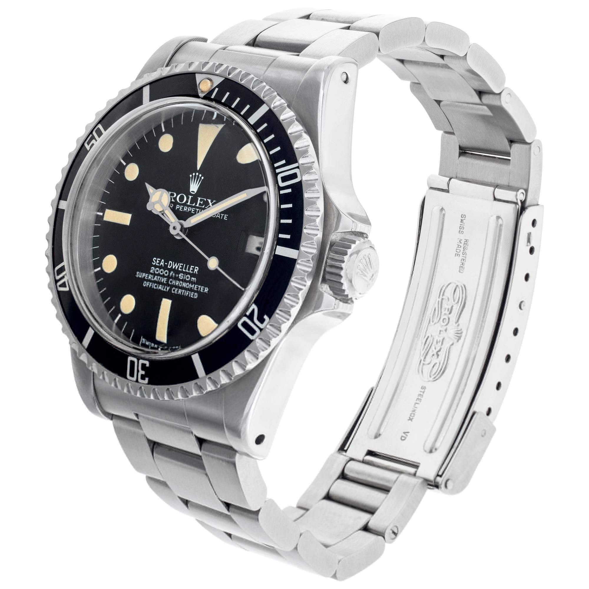 Vintage Rolex Sea-Dweller with Mark 1 dial in stainless steel. Nice patina on the original hands and dial. Auto w/ sweep seconds and date. 40 mm case size. Circa 1979. Ref 1665. **Bank Wire Only at this Price** Fine Pre-owned Rolex Watch. Certified