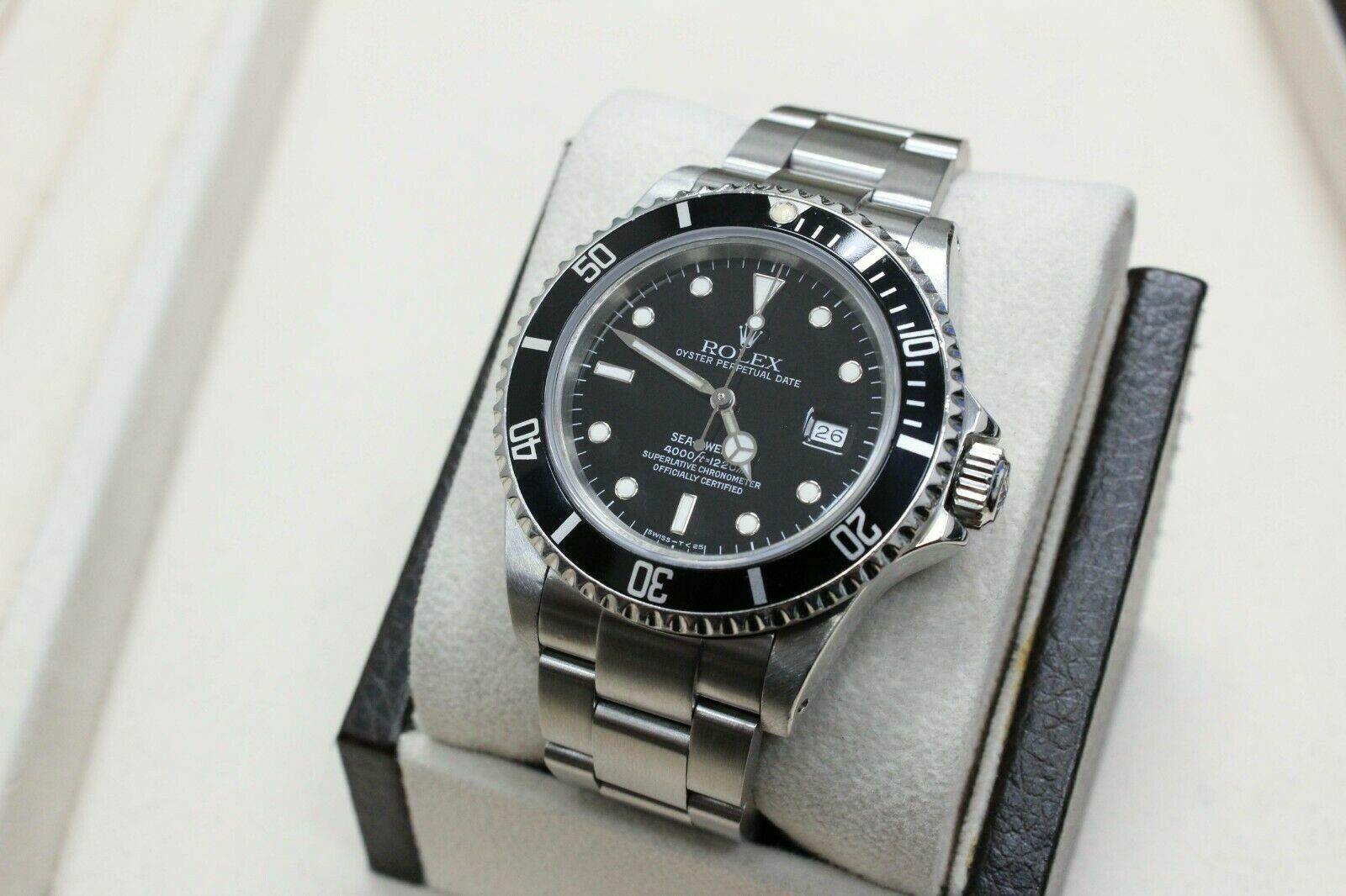 Style Number: 16660

Serial: 8350***

Model: Sea Dweller

Case Material: Stainless Steel

Band: Stainless Steel

Bezel: Black

Dial: Black

Face: Sapphire Crystal

Case Size: 40mm

Includes:

-Elegant Watch Box

-Certified Appraisal

-1 Year
