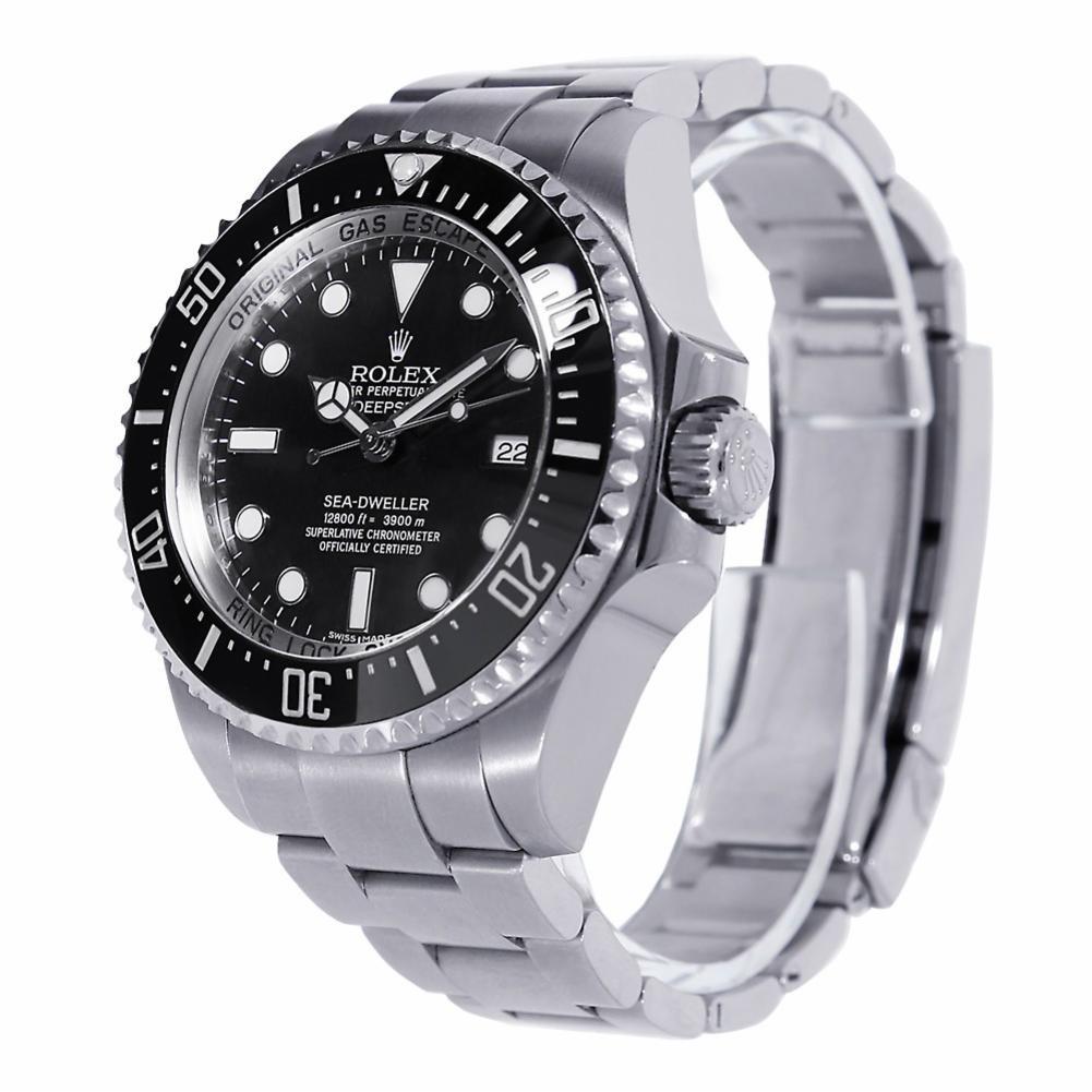 Rolex Sea-Dweller Reference #:116660. 44mm stainless steel case with Ring Lock System allowing the watch to withstand 2.98 metric tonnes of water pressure, unidirectional rotating ceramic bezel, black dial, long lasting blue luminescent hands and