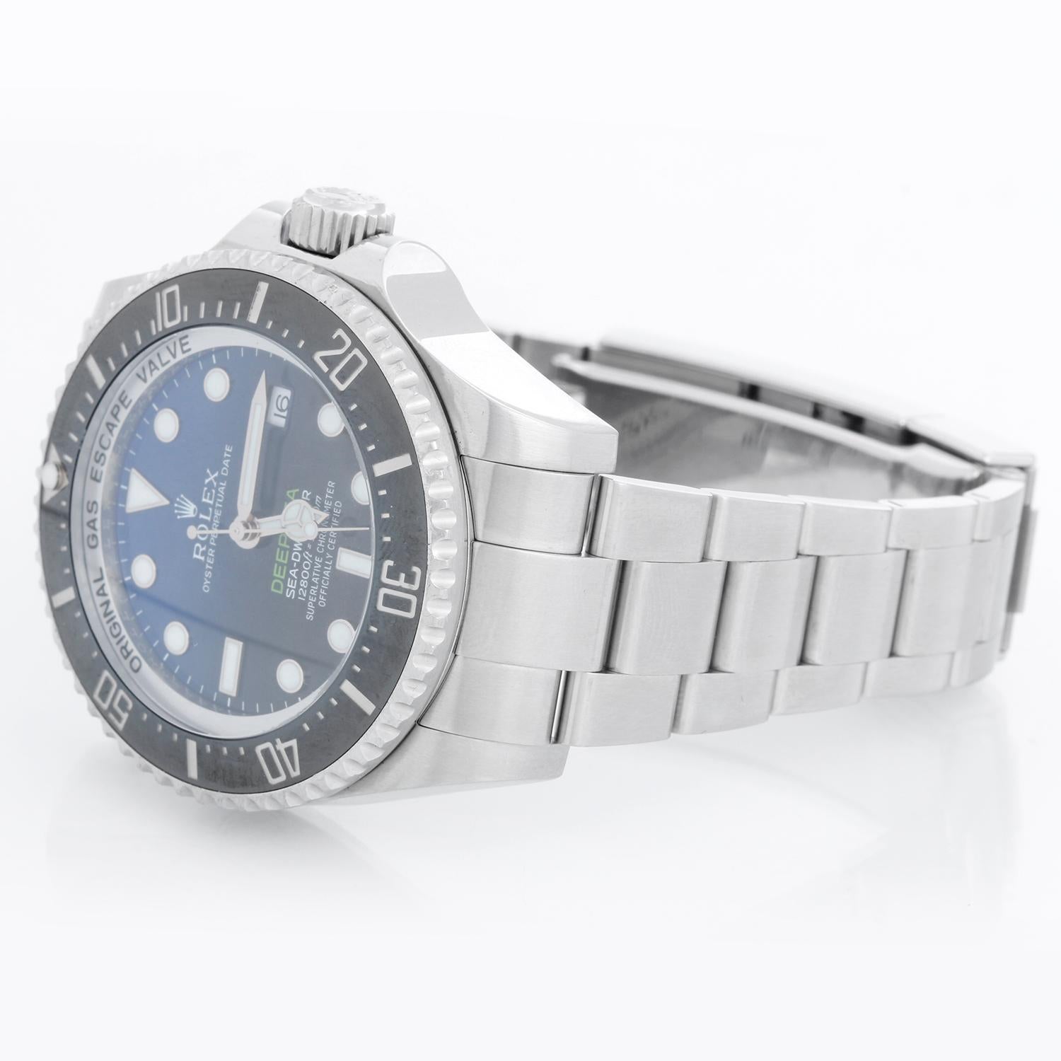 Rolex Sea Dweller-Deep Sea Blue 116660 Men's Watch James Cameron - Automatic. Stainless Steel ( 44mm ). Gradient deep blue with unidirectional rotating ceramic bezel. Oyster bracelet with glide lock and adjustable clasp. Pre-owned with  Rolex box