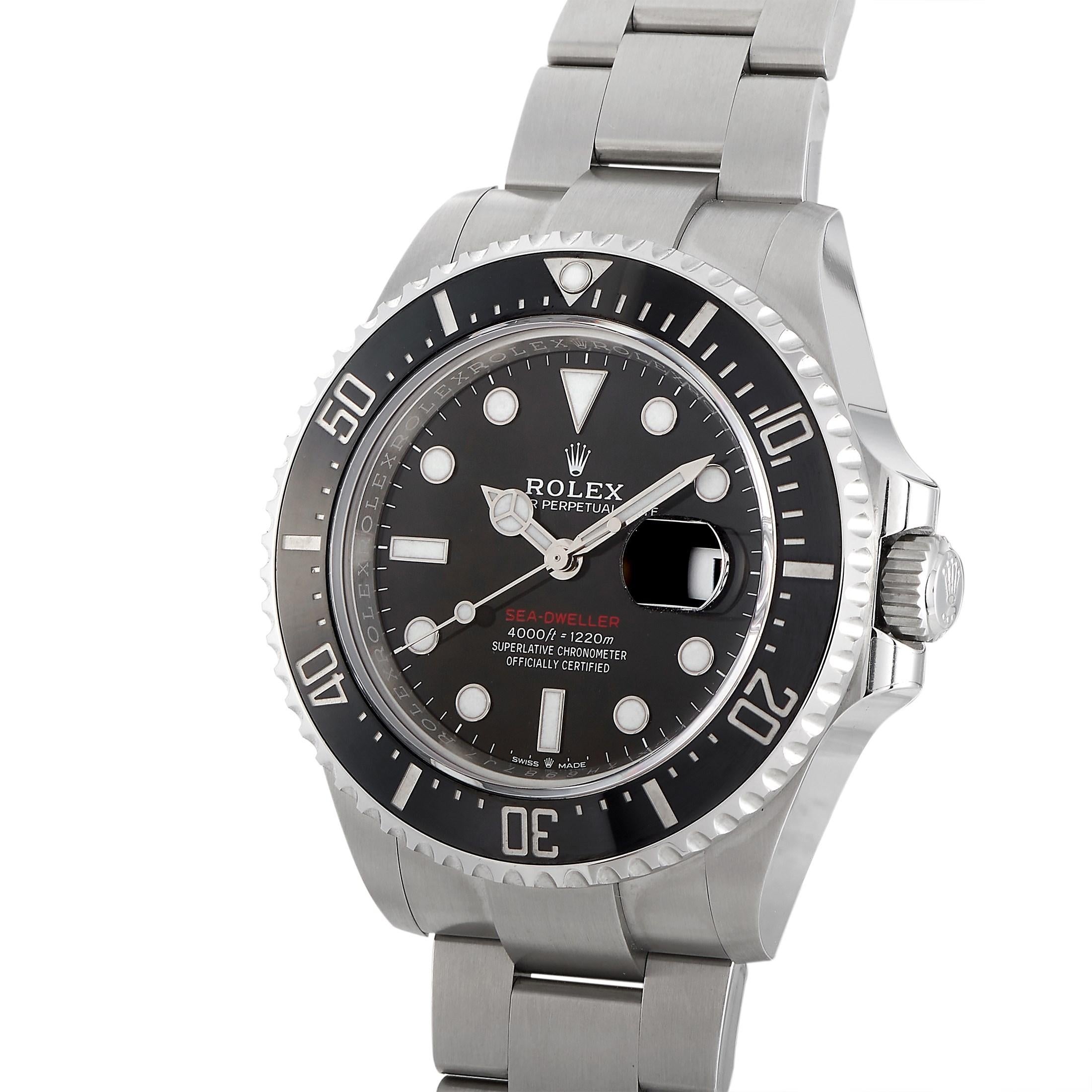 This Rolex Sea-Dweller Oystersteel 43 mm Watch, reference number 126600, includes an oystersteel case measuring 43 mm in diameter with a large black ceramic uni-directional rotating bezel featuring white hour markers. It is presented on a matching
