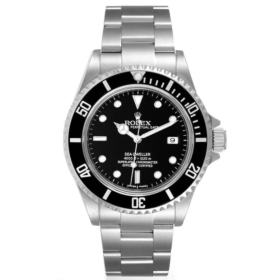 Rolex Seadweller 4000 Black Dial Steel Mens Watch 1660 NOS Box Card. Officially certified chronometer self-winding movement. Stainless steel case 40 mm in diameter. Rolex logo on a crown. Special time-lapse unidirectional rotating bezel. Scratch