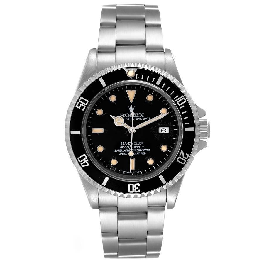 Rolex Seadweller Automatic Steel Black Dial Vintage Mens Watch 16660 Papers. Officially certified chronometer self-winding movement. Stainless steel round case 40.0 mm in diameter. Rolex logo on the crown. Special time-lapse unidirectional rotating