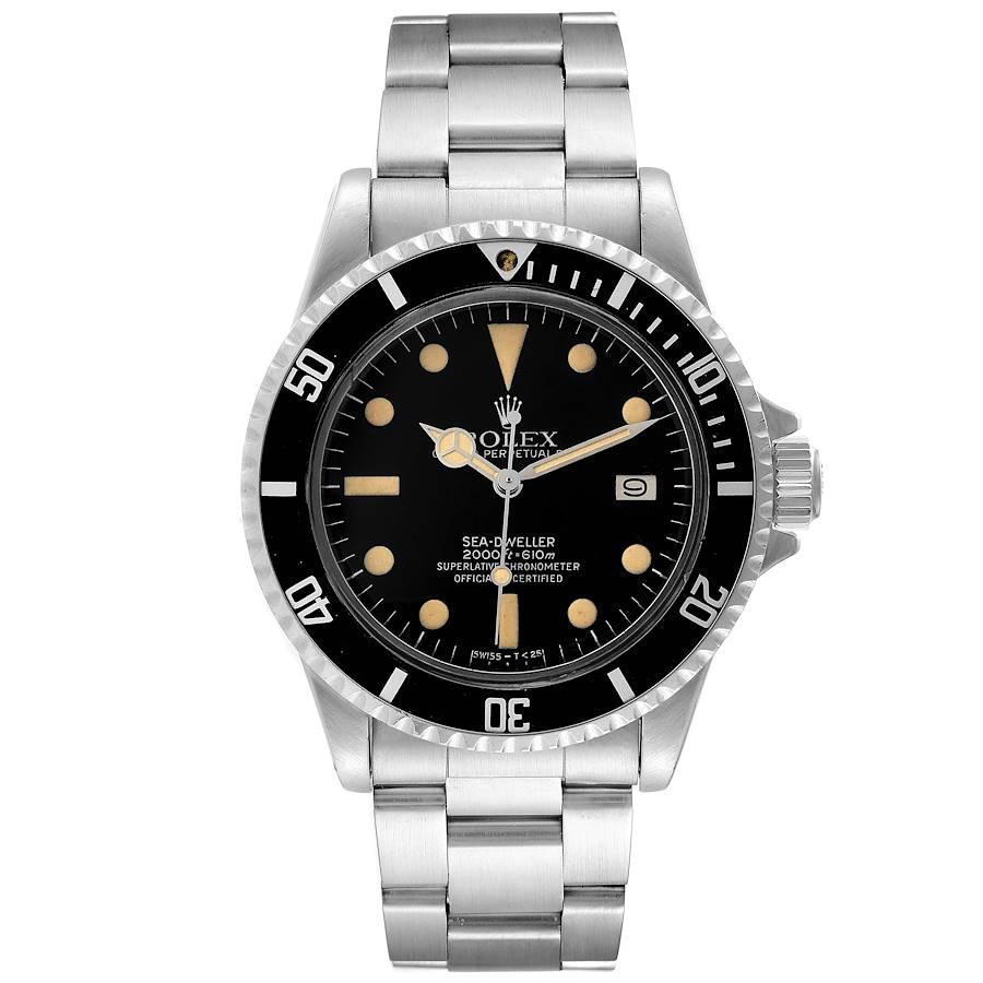 Rolex Seadweller Black Dial Vintage Steel Mens Watch 1665. Officially certified chronometer self-winding movement. Stainless steel case 40 mm in diameter. Rolex logo on a crown. Bi-directional revolving bezel calibrated for 60 units. Acrylic