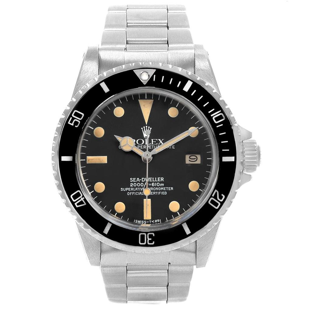 Rolex Seadweller Vintage Steel Mens Watch 1665 Box Papers . Officially certified chronometer automatic self-winding movement. Stainless steel case 40 mm in diameter. Rolex logo on a crown. Bi-directional revolving bezel calibrated for 60 units.