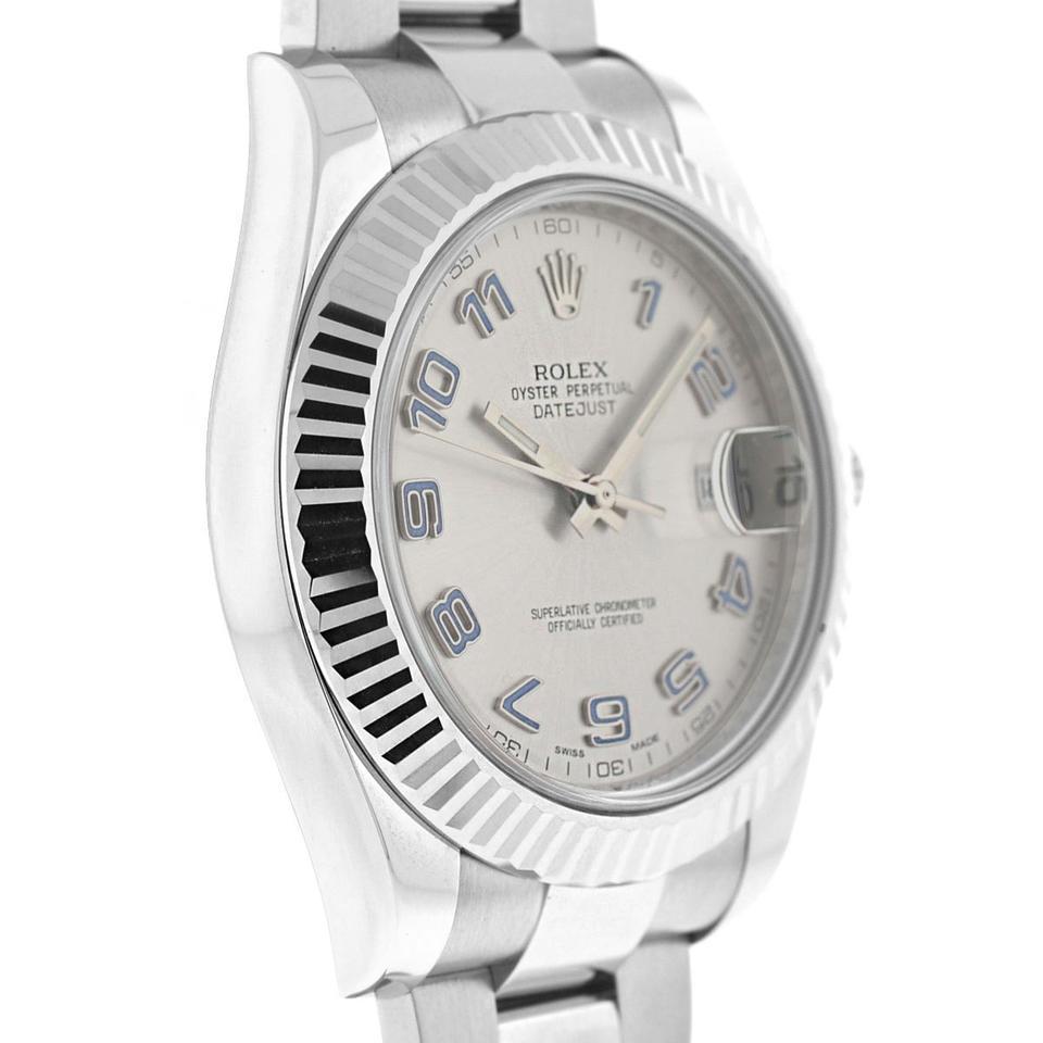 Company- Rolex
Model- Datejust II
Case Metal- Stainless Steel
Case Size- 41mm
Dial- Rhodium Arabic
Bezel- 18k White Gold Fluted
Bracelet- Stainless Steel - Fits Wrist Size - 7