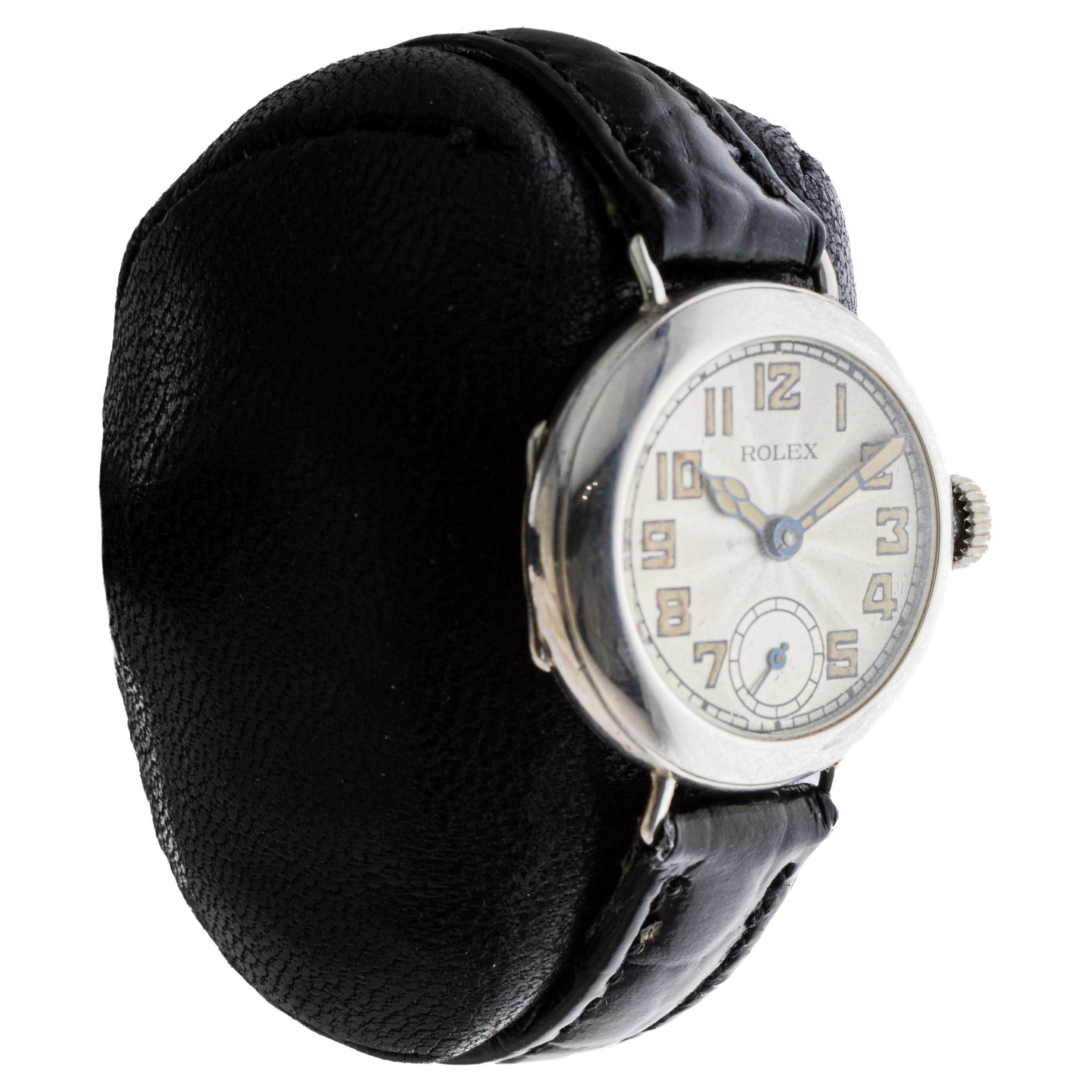 FACTORY / HOUSE: Rolex Watch Company
STYLE / REFERENCE: Campaign Style 
METAL / MATERIAL: Sterling Silver
CIRCA / YEAR: 1916
DIMENSIONS / SIZE: Length 32mm X Diameter 27mm
MOVEMENT / CALIBER: Manual Winding / 15 Jewels / Caliber Rebberg
DIAL /