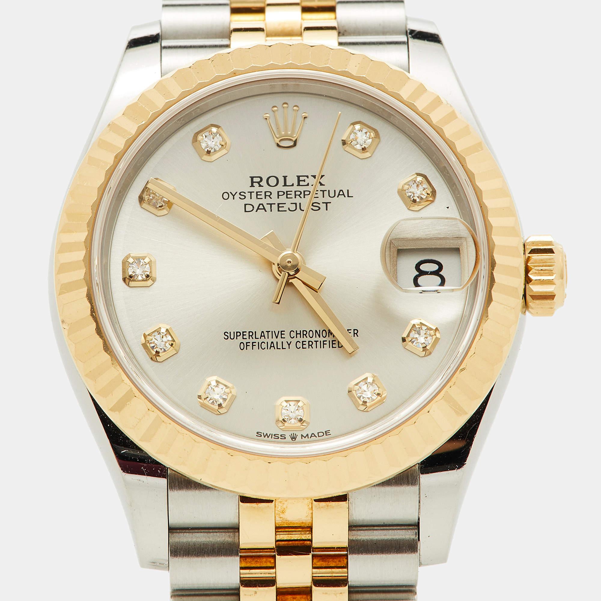 The Rolex Datejust is an exquisite women's wristwatch. It features a stunning silver sunburst dial, accented with diamonds, set within a 31mm case crafted from a luxurious combination of 18K yellow gold and stainless steel. This timepiece elegantly