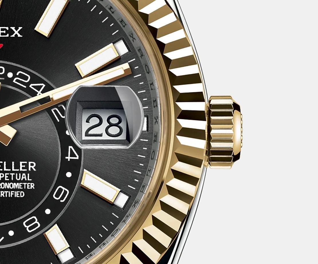 42 mm yellow Rolesor case comprised of a 904L steel monobloc middle case, screw-down back, screw-down crown, 18K yellow gold fluted bezel with bidirectional rotatable Rolex Ring Command, scratch-resistant sapphire crystal with cyclops lens over the