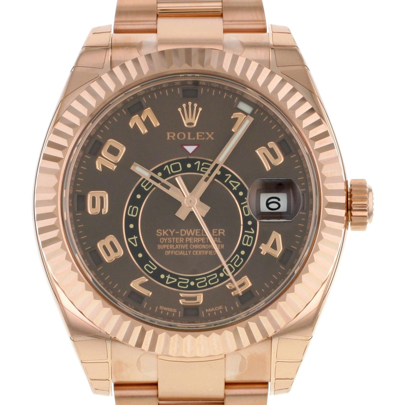 This brand new Rolex Sky-Dweller 326935 CH is a beautiful men's timepiece that is powered by an automatic movement which is cased in a rose gold case. It has a round shape face, date, multiple time zone dial and has hand Arabic numerals style