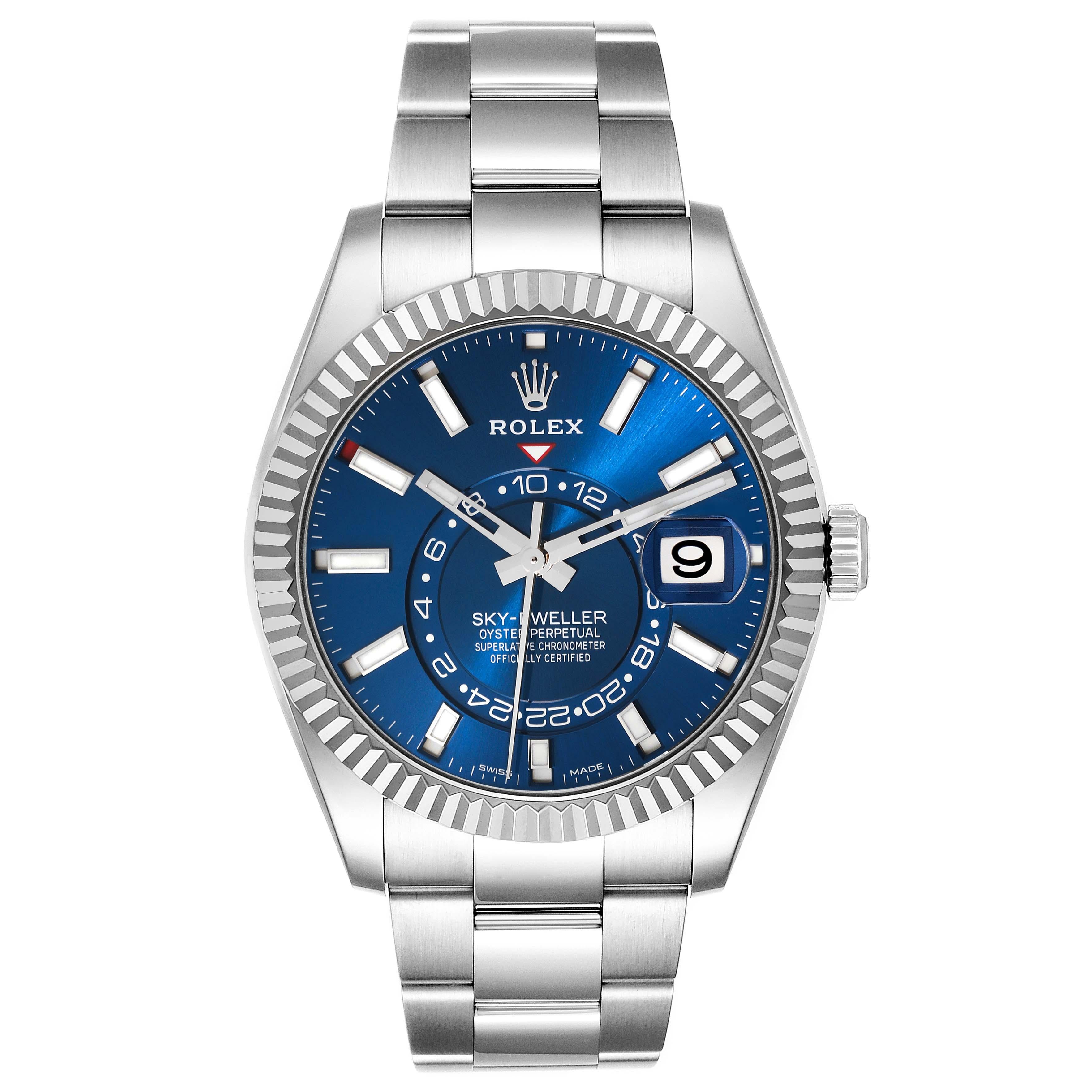 Rolex Sky-Dweller Blue Dial Steel White Gold Mens Watch 326934 Box Card. Officially certified chronometer automatic self-winding movement. Dual time zones, annual calendar. Paramagnetic blue Parachrom hairspring. High-performance Paraflex shock