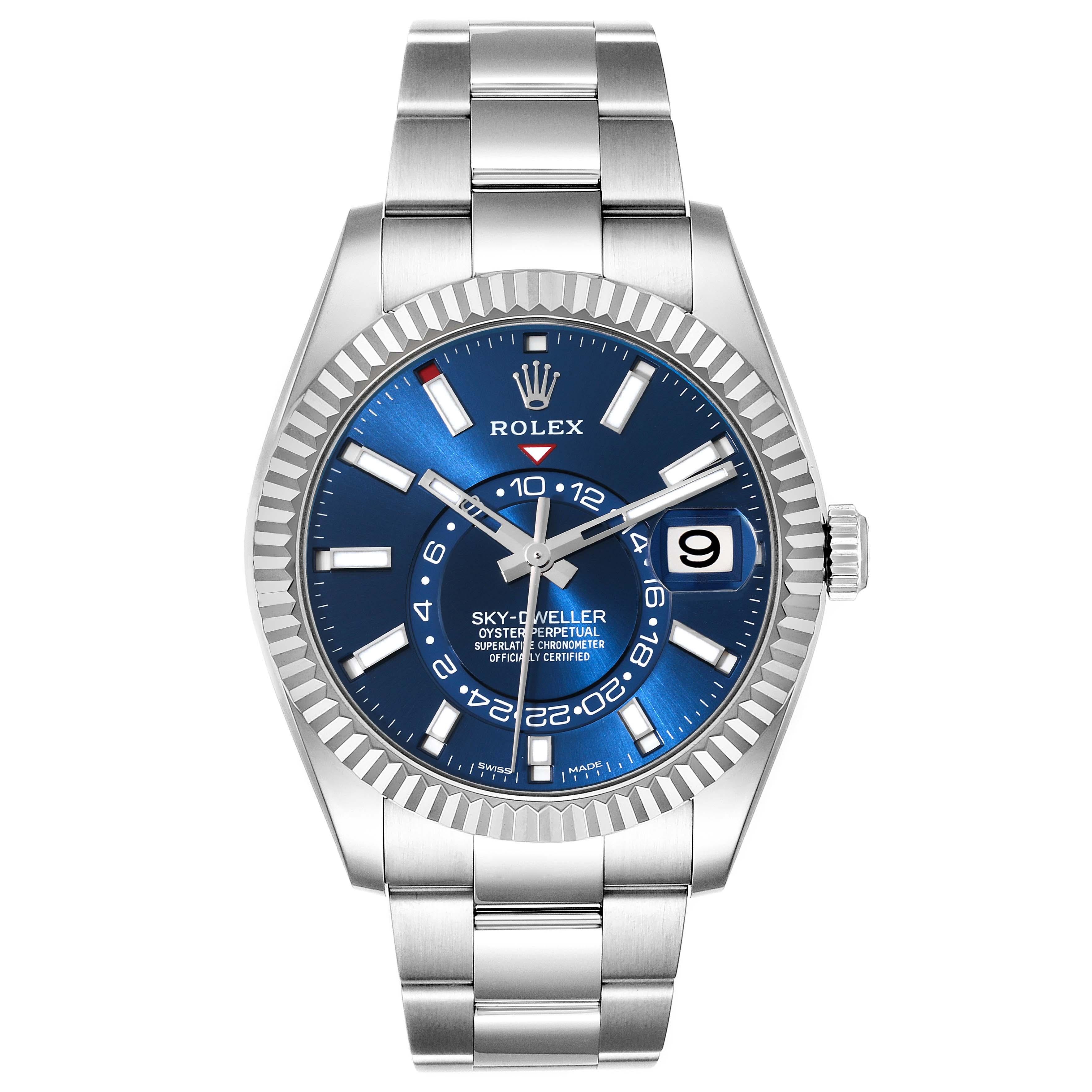 Rolex Sky-Dweller Blue Dial Steel White Gold Mens Watch 326934 Box Card. Officially certified chronometer automatic self-winding movement. Dual time zones, annual calendar. Paramagnetic blue Parachrom hairspring. High-performance Paraflex shock
