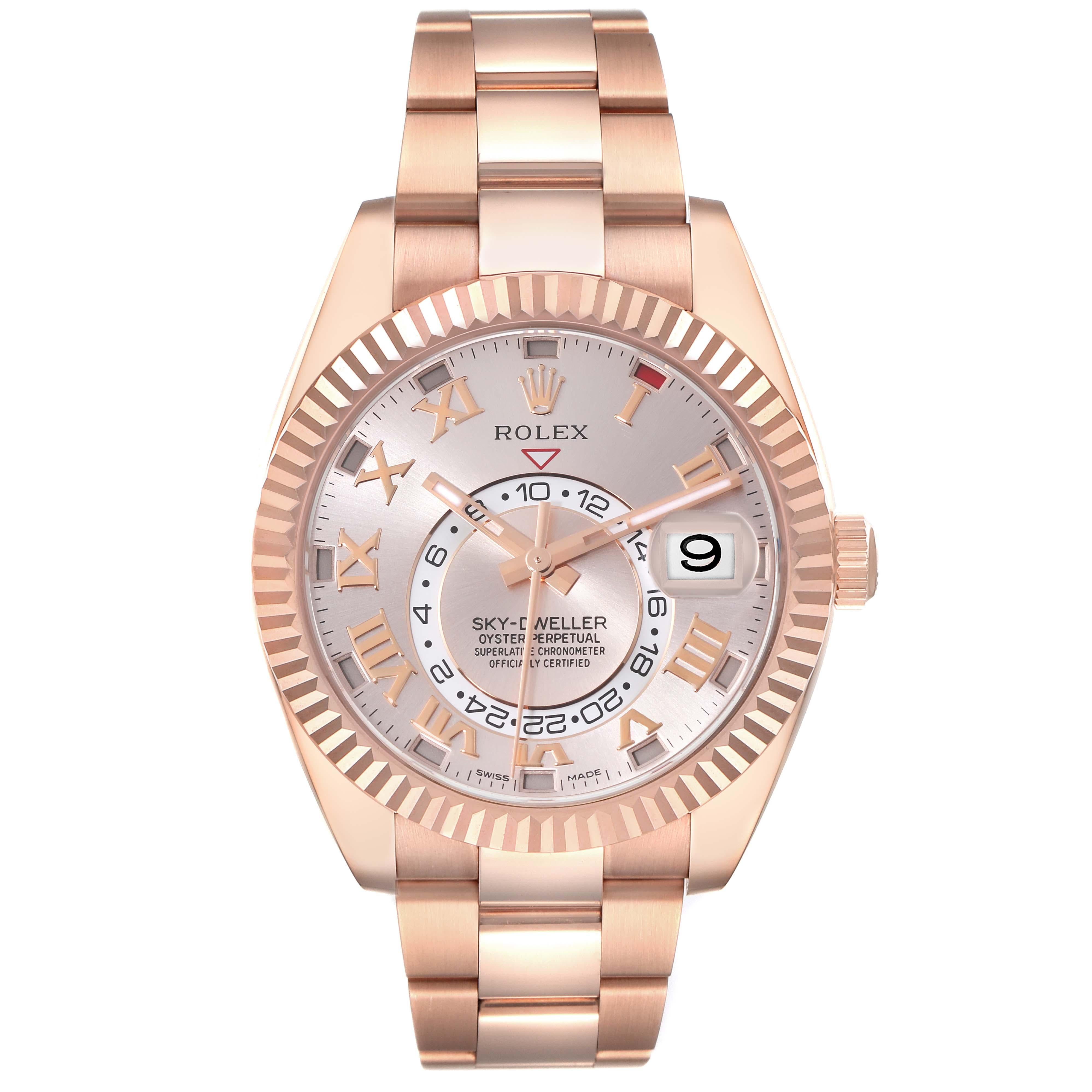 Rolex Sky-Dweller Rose Gold Sundust Dial Mens Watch 326935. Officially certified chronometer self-winding movement. Dual time zones, annual calendar. Paramagnetic blue Parachrom hairspring. High-performance Paraflex shock absorbers. 18k rose gold