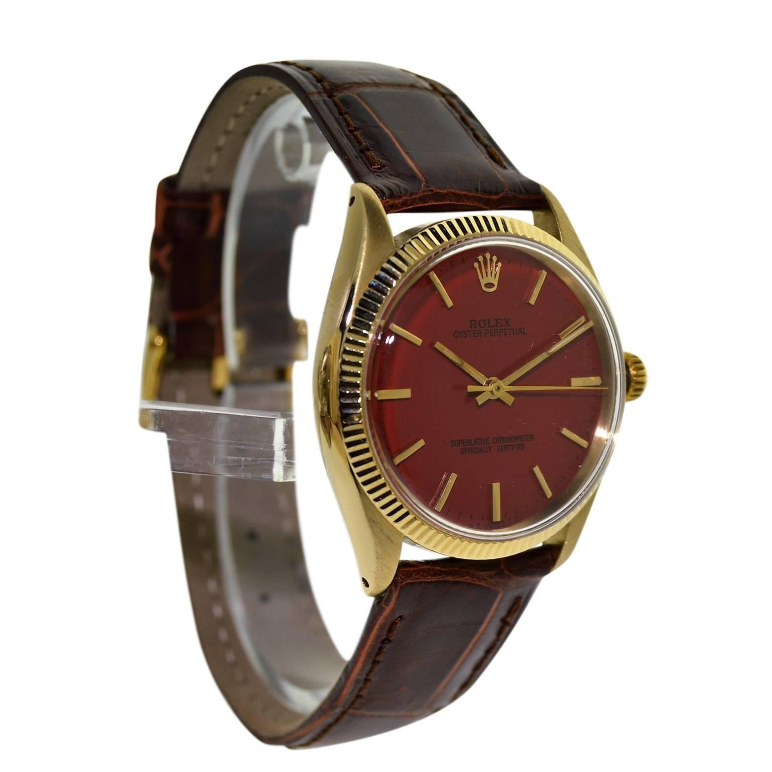 Rolex Yellow Gold Custom Red Dial Oyster Perpetual Wristwatch, circa 1960s In Excellent Condition In Long Beach, CA