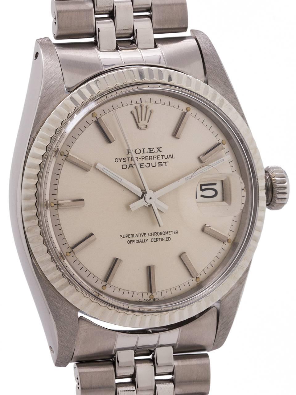 
Rolex Stainless Steel Datejust ref # 1601 serial# 1.8 million circa 1968. 36mm diameter case with 14K white gold fluted bezel and acrylic crystal. Original silvered satin pie pan dial with applied silver indexes and silver baton hands. Powered by