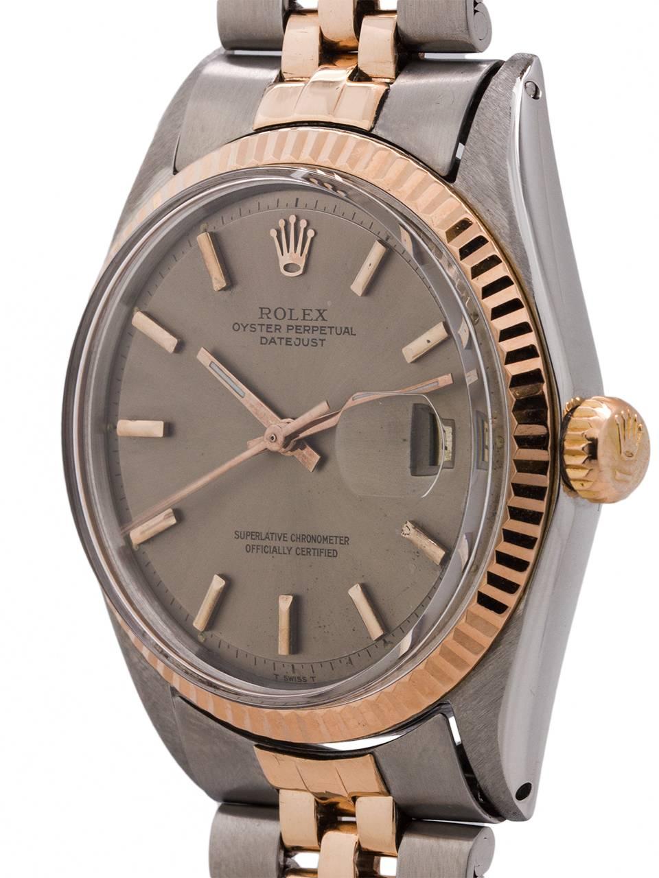 
Vintage man’s Rolex stainless steel and 14K pink gold Datejust ref 1601 serial # 2.1 million circa 1969. Full sized man’s model 36mm diameter Oyster case with 14K pink gold fluted bezel and acrylic crystal. With original “taupe gray” dial with