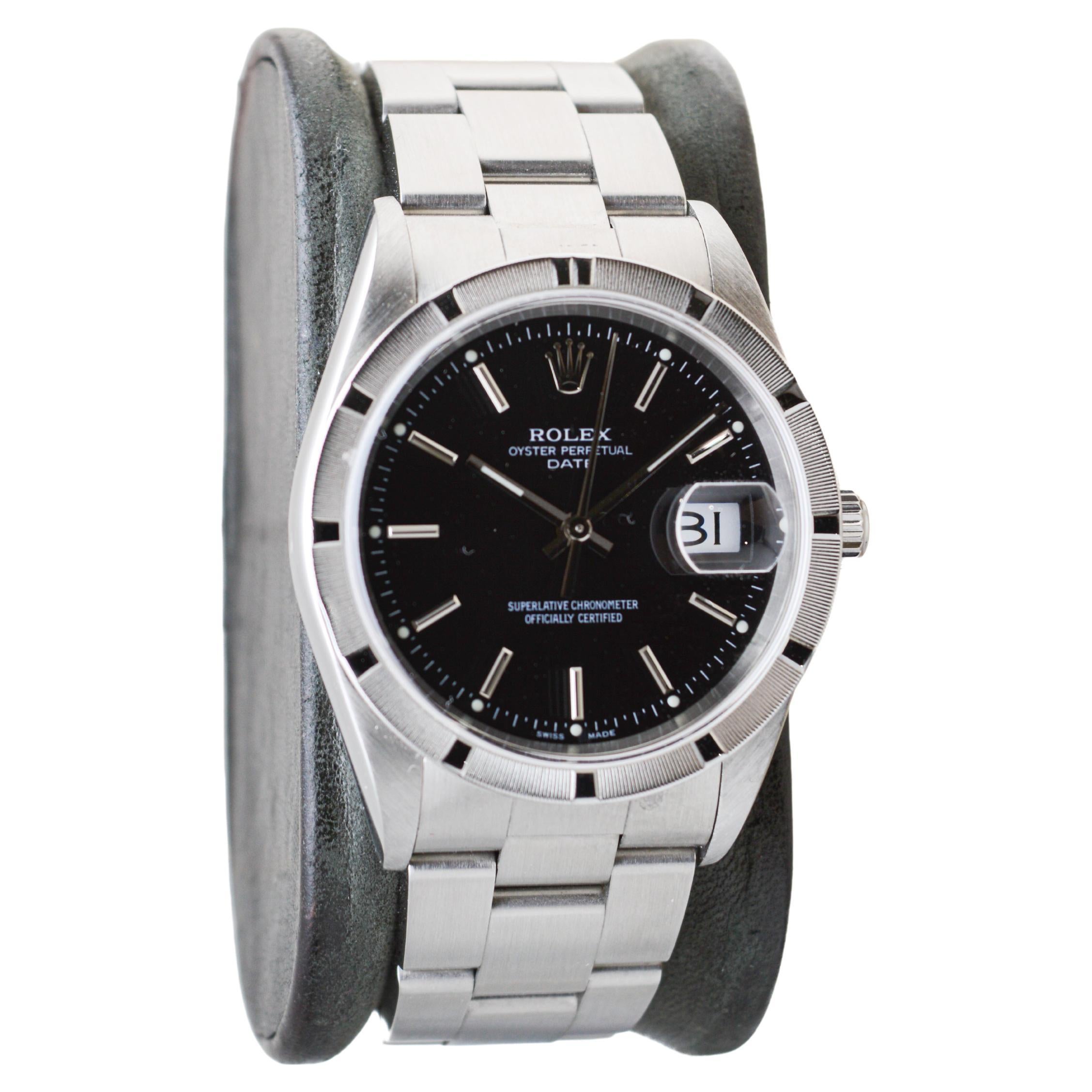 FACTORY / HOUSE: Rolex Watch Company
STYLE / REFERENCE: Oyster Perpetual Date / Reference 2120
METAL / MATERIAL: Stainless Steel
CIRCA / YEAR: 2002
DIMENSIONS / SIZE: Length X Diameter
MOVEMENT / CALIBER: Perpetual Winding / 31 Jewels / Caliber