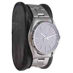 Rolex Stainless Oyster Perpetual with Machined Bezel Rare Charcoal Dial 1960's