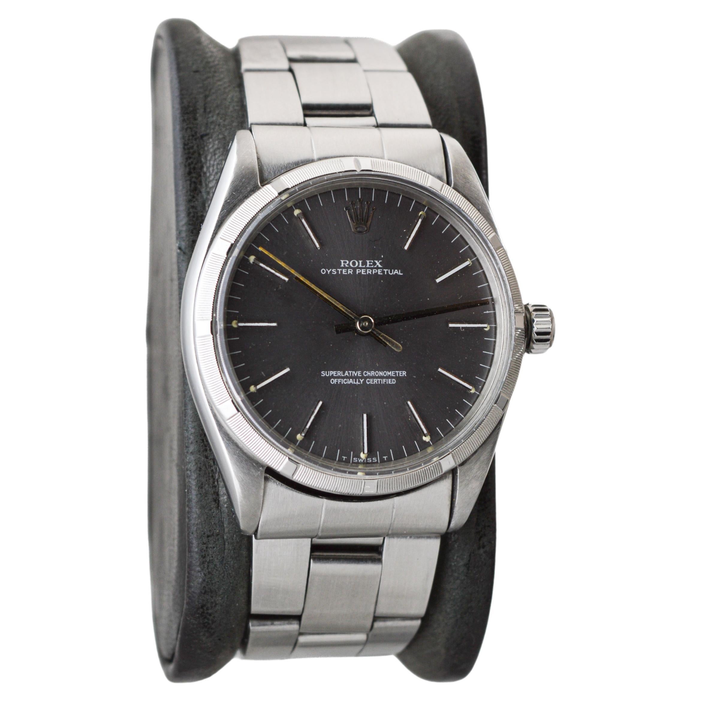 Modern Rolex Stainless Oyster Perpetual with Machined Bezel Rare Charcoal Dial 1960's For Sale