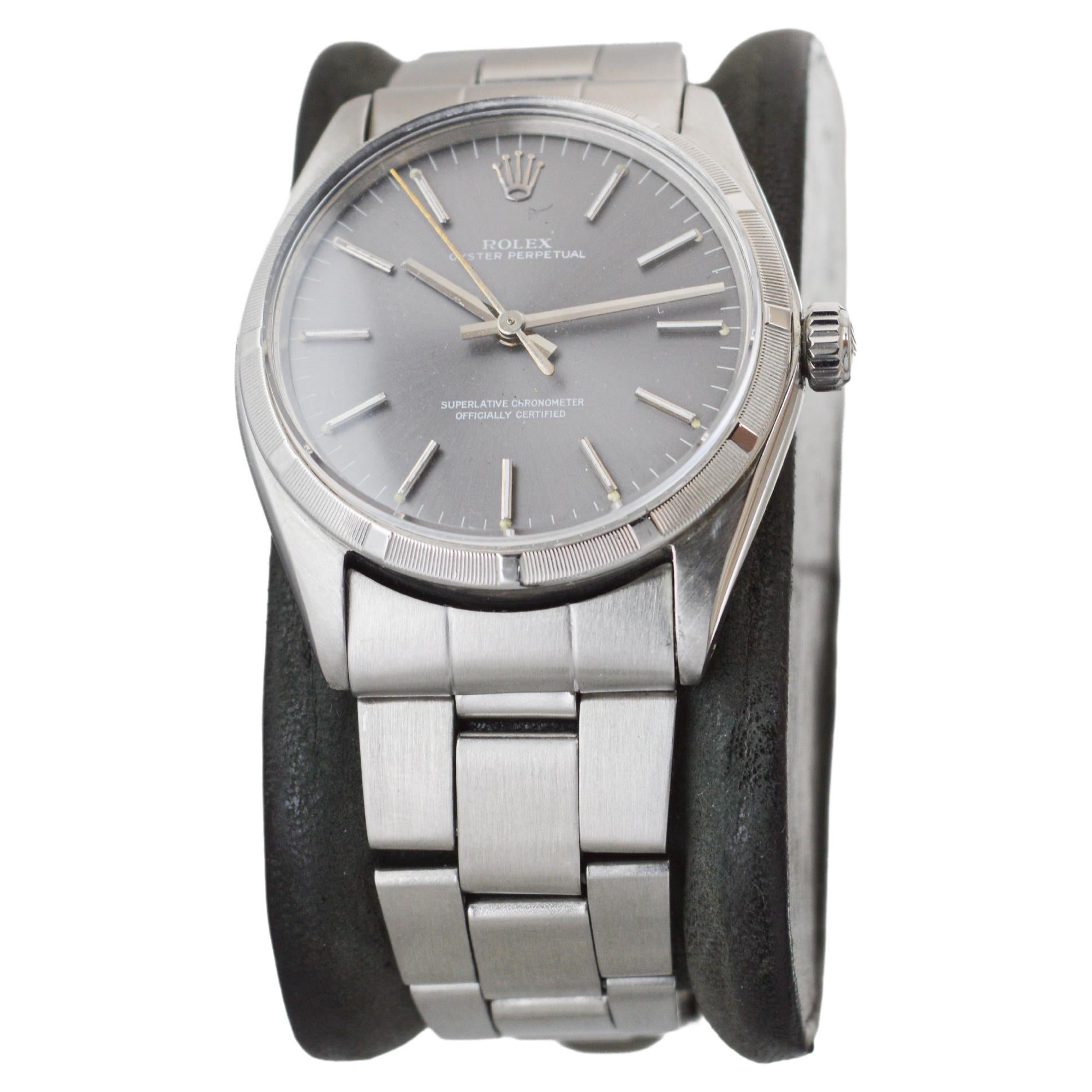 Women's or Men's Rolex Stainless Oyster Perpetual with Machined Bezel Rare Charcoal Dial 1960's For Sale